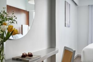 Letto o letti in una camera di Lato Boutique Hotel