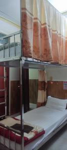 a couple of bunk beds in a room at New Nhat Minh HomeStay in Ninh Binh