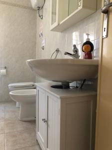 Koupelna v ubytování HOME TONINO