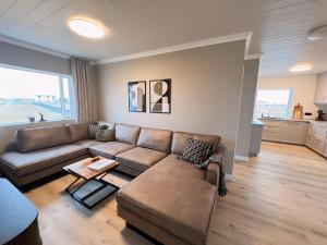 Zona de estar de Garður Apartments