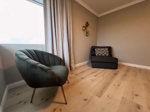 Zona de estar de Garður Apartments