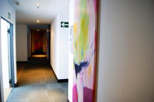Postel nebo postele na pokoji v ubytování Hotel Sercotel Plana Parc