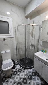 Koupelna v ubytování Alfa-Central Luxury Condo by Optimum Link