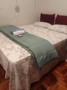 Łóżko lub łóżka w pokoju w obiekcie HOSTEL e POUSADA SALVADOR PRAIA