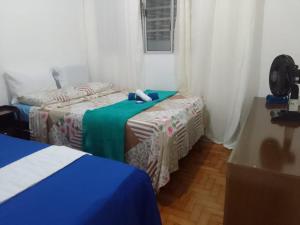 HOSTEL e POUSADA SALVADOR PRAIAにあるベッド