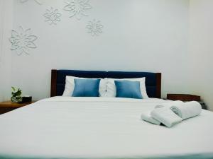 Postel nebo postele na pokoji v ubytování Adventure Hotel