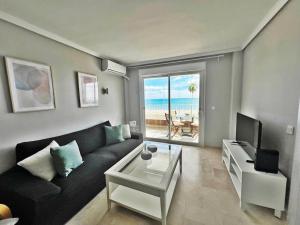 Χώρος καθιστικού στο Primera línea de playa frontal con vistas al mar
