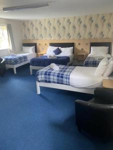 The Mill Forge Hotel客房内的一张或多张床位