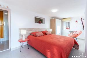 A bed or beds in a room at VH CostaBlanca - AMOR DEL SUR