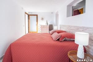 A bed or beds in a room at VH CostaBlanca - AMOR DEL SUR