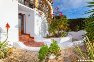 A garden outside VH CostaBlanca - AMOR DEL SUR