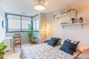 Postel nebo postele na pokoji v ubytování EnviaStudio R&R + 37 fotografií