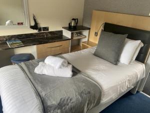 The Mill Forge Hotel客房内的一张或多张床位