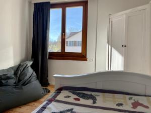 Posezení v ubytování Gemütliches Haus mit Seeblick