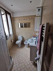 a bathroom with a toilet and a sink and a shower at Allori in Florence