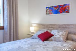 A bed or beds in a room at VH CostaBlanca - AMOR DEL SUR