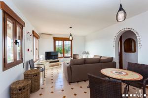 A seating area at VH CostaBlanca - AMOR DEL SUR