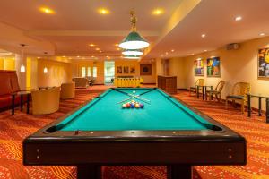 a pool table in a hotel room at IFA Graal-Müritz Hotel & Spa in Graal-Müritz