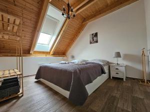 En eller flere senge i et værelse på Apartmán MÁJA Mikulov