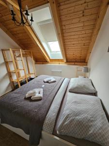 En eller flere senge i et værelse på Apartmán MÁJA Mikulov