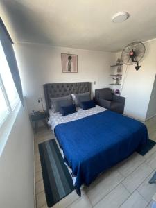 Postel nebo postele na pokoji v ubytování Departamento en Santiago centro cerca de movistar arena, Caupolican + 37 fotografií