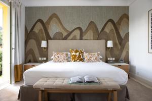 Hotel Royal-Riviera客房内的一张或多张床位