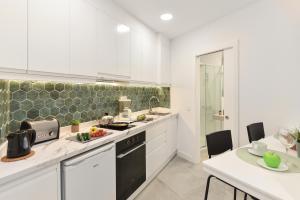 Kjøkken eller kjøkkenkrok på Apartamentos Don Carlos