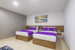Postel nebo postele na pokoji v ubytování WinDay Hotel Express