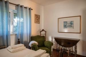 Ένα ή περισσότερα κρεβάτια σε δωμάτιο στο Casa do Magoito