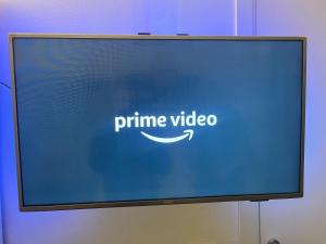 a television screen with the name of prime video on it at OnSuite&Terrace By COMO in Erba