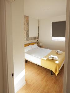 Posteľ alebo postele v izbe v ubytovaní Rental Room Valladolid