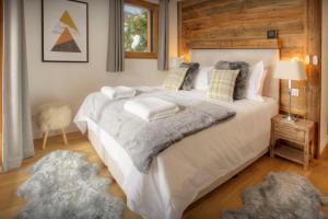 A bed or beds in a room at Chalet Behansa - OVO Network