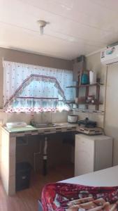 Kuchyň nebo kuchyňský kout v ubytování Apartamentos Caimán 3