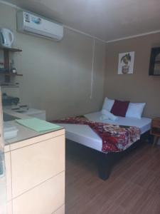 En eller flere senge i et værelse på Apartamentos Caimán 3