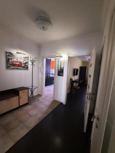 a view of a living room with a hallway at Шикарная 2к квартира Центральный парк Университет 70м in Irpin'