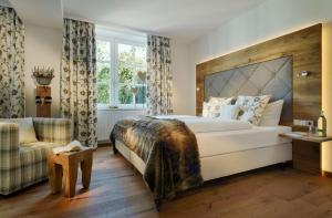 Postel nebo postele na pokoji v ubytování Romantik Hotel Knippschild