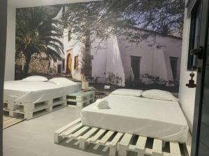 Postel nebo postele na pokoji v ubytování Palmira House + 37 fotografií