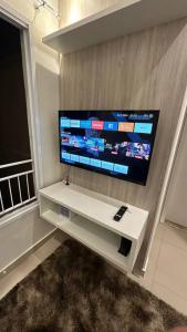 TV a/nebo společenská místnost v ubytování Apto próx arm Panunzzio com piscina