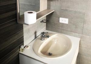 Koupelna v ubytování Hotel Suites La Fontana