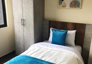 Postel nebo postele na pokoji v ubytování Hotel Suites La Fontana
