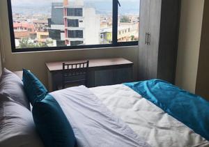 Postel nebo postele na pokoji v ubytování Hotel Suites La Fontana