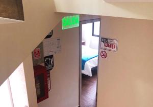 Postel nebo postele na pokoji v ubytování Hotel Suites La Fontana
