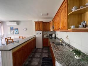 Kuchyň nebo kuchyňský kout v ubytování Apartamento en los Gigantes con vistas al mar