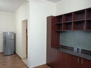 Kuchyň nebo kuchyňský kout v ubytování Greenview Royal Stay Near Amrita Hospital Edappally