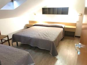 Cama o camas de una habitación en Holiday home in Lido di Jesolo 24810