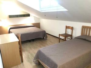 Cama o camas de una habitación en Holiday home in Lido di Jesolo 24810