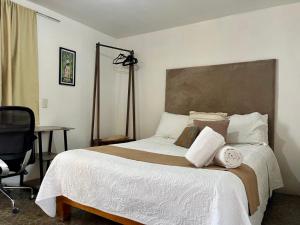 Postel nebo postele na pokoji v ubytování Casa Miranda Morelos