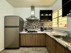 Kuchyň nebo kuchyňský kout v ubytování Casa Miranda Morelos