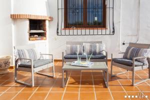 A seating area at VH CostaBlanca - AMOR DEL SUR
