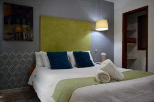 Postel nebo postele na pokoji v ubytování Casa Miranda Morelos